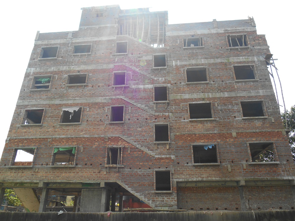 Construction works going on in Achinta Bhawan Project